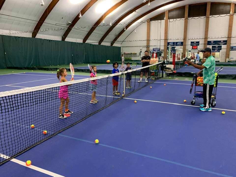 Children playing tennis